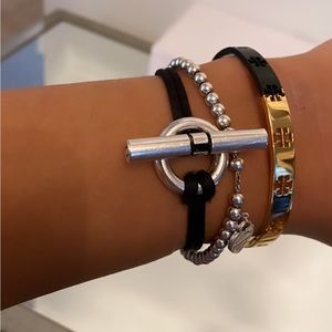 Tory Burch bracelet 1/2 gold 1/2 black